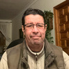 John E